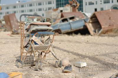 Abandoned shopping cart on beach