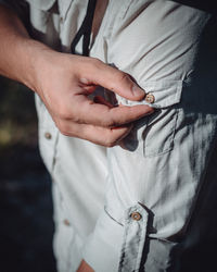 Close-up of man holding hands