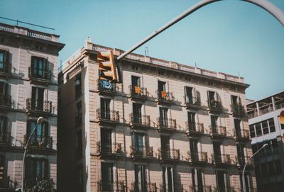 Low angle view of building against blue sky