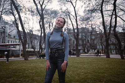 Portrait of woman standing on the grass