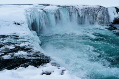 Scenic view of frozen goðafoss