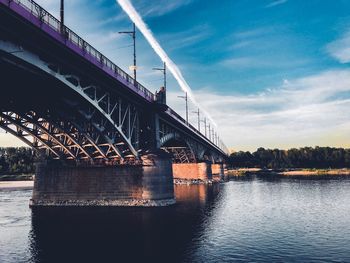 Low angle view of bridge over river