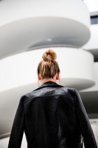 Rear view of woman with umbrella