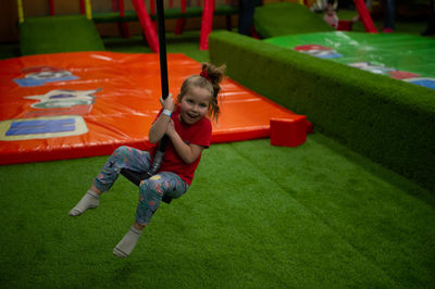 Children play a variety of games in fun room