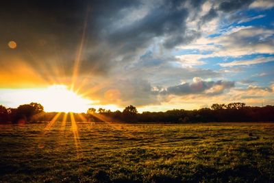 Scenic view of landscape at sunset