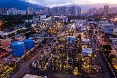 High angle view of illuminated buildings in city at night