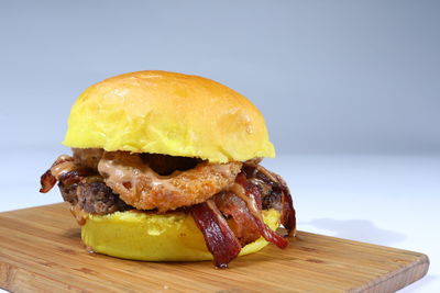 Close-up of burger on cutting board