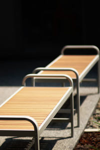 Close-up of empty seats in row