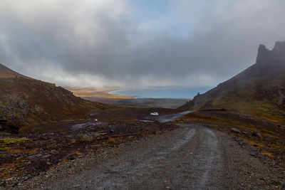 Road amidst landscape against sky