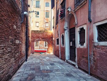 Narrow alley with buildings in background