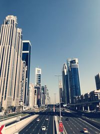 View of city street against clear sky