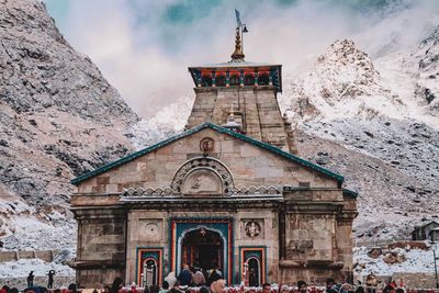 Group of people in temple against building