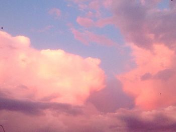 Low angle view of dramatic sky during sunset