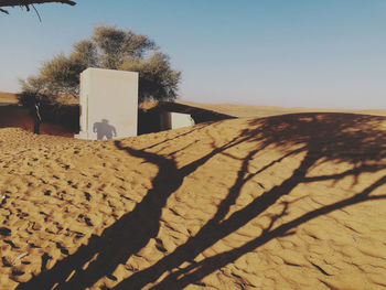 Scenic view of desert against clear sky