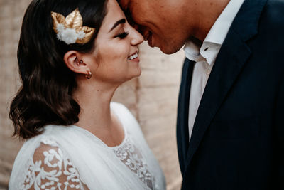 Close-up of couple holding hands