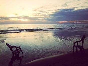 Scenic view of sea at sunset