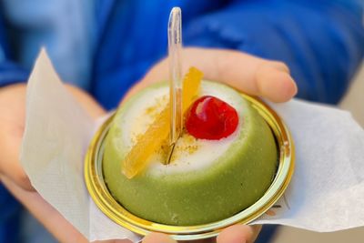 Midsection of woman holding food