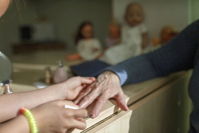 Midsection of people at music concert