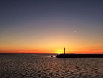 Scenic view of sea at sunset