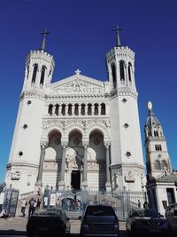 Low angle view of cathedral against blue sky