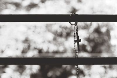 Close-up of metal against sky