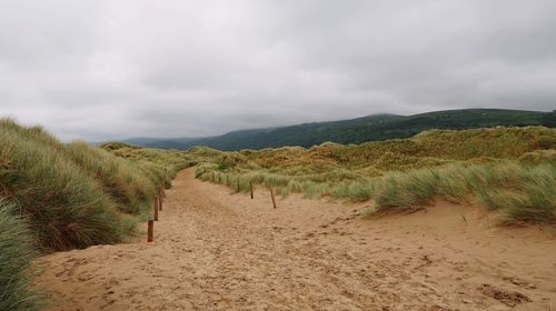 Scenic view of land against sky