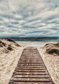 View of empty beach against sky