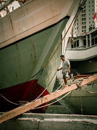 Man working on boat