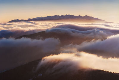 Low angle view of clouds in sky during sunset