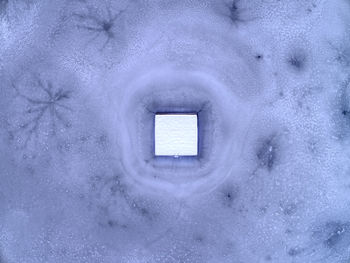 View of window on snow covered landscape
