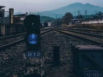 Train on railroad track against sky