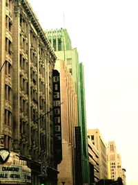 Low angle view of skyscrapers against sky