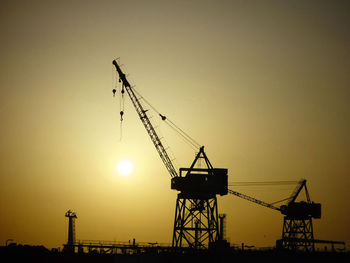 Low angle view of crane at construction site