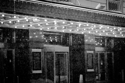 Low angle view of illuminated building at night