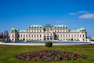 Facade of historic building against blue sky