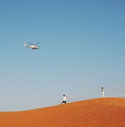 Low angle view of hot air balloon against clear sky