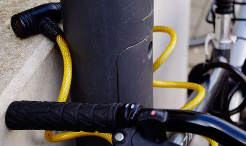 Close-up of yellow bicycle