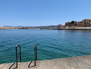 Scenic view of sea against clear blue sky