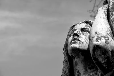 Close-up of statue against sky