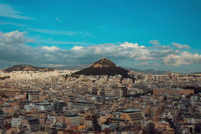 Aerial view of townscape against sky