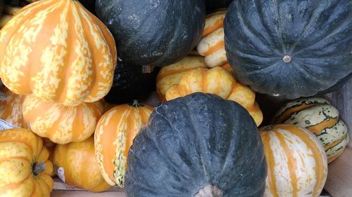 Full frame shot of pumpkins in market