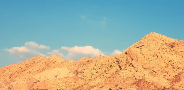 Panoramic view of mountain range against sky