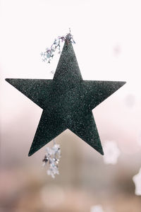 Close-up of christmas tree against sky