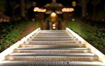 Illuminated staircase at night