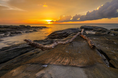 Scenic view of sea against sky during sunset