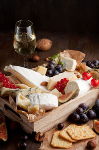 Close-up of fruits and vegetables on cutting board