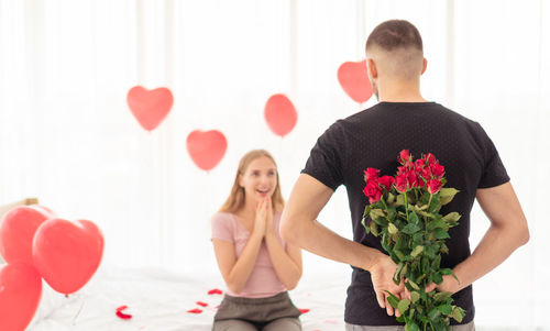 Couple kissing with heart shape