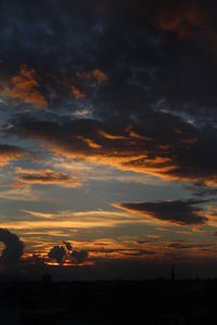 Scenic view of landscape against cloudy sky