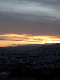 Cityscape against sky during sunset