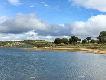 Scenic view of river against sky